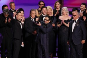 Eugene and Dan Levy on stage at the 2024 Emmy Awards, bringing humor and warmth to the event.